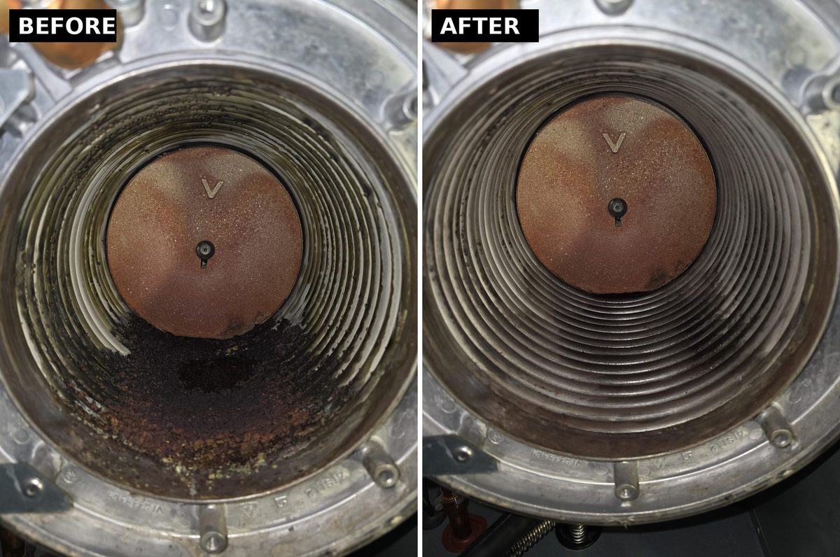 Inside of a boiler heat exchanger before and after cleaning: the left side shows built-up debris, the right side shows clean coils.